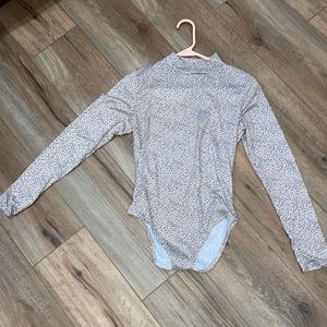 Pink cheetah print body suit